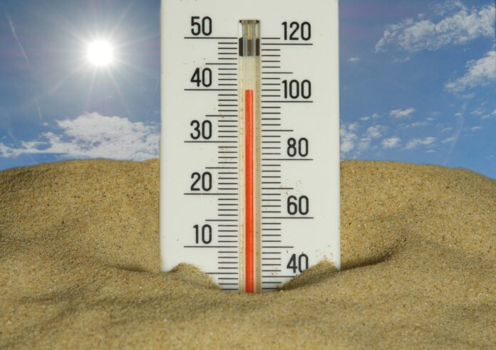 Photo by Immo Wegmann The thermometer shows a very hot temperature.