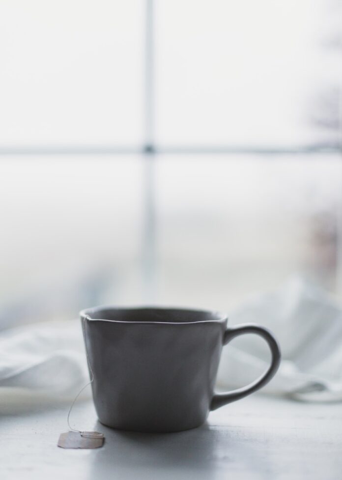 white ceramic teacup